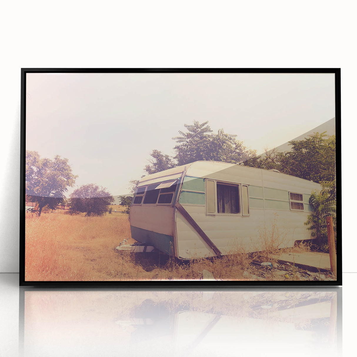 Large abstract wall art featuring a caravan in monochrome shades, framed in black acrylic.