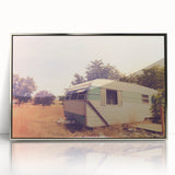 Art deco poster of a vintage caravan in silver frame, featuring pastel blue and pink colors, ideal for nursery wall art.