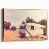 Framed canvas of a vintage caravan in a colorful landscape, ideal for living room decor.