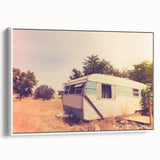 Framed canvas featuring a vintage caravan in a black and white landscape, ideal for bedroom wall art.