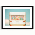 Extra large abstract art print of a colorful caravan scene on textured canvas, framed in black, ideal for living room decor.