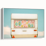 Framed canvas featuring a vintage black and white landscape with caravans, ideal for bedroom wall art.