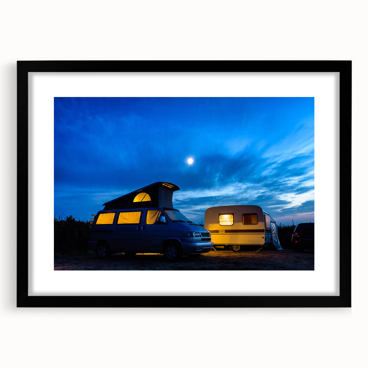 Extra large abstract art print featuring a colorful caravan design, textured surface, on a black framed mat.