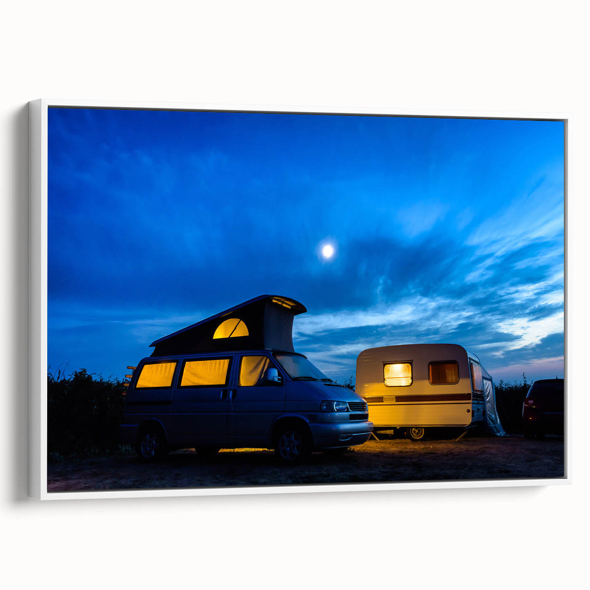 Framed canvas featuring a vintage caravan in a landscape, in black and white tones, ideal for bedroom wall art.