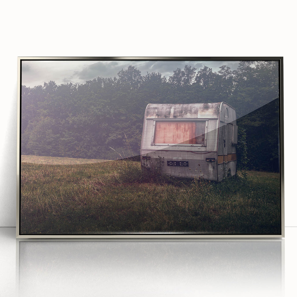Art deco style poster of a colorful caravan, printed on silver-framed acrylic, suitable for modern nursery wall decor.