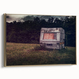 Framed canvas featuring a vintage caravan in a colorful landscape, ideal for adding a retro touch to any living space.