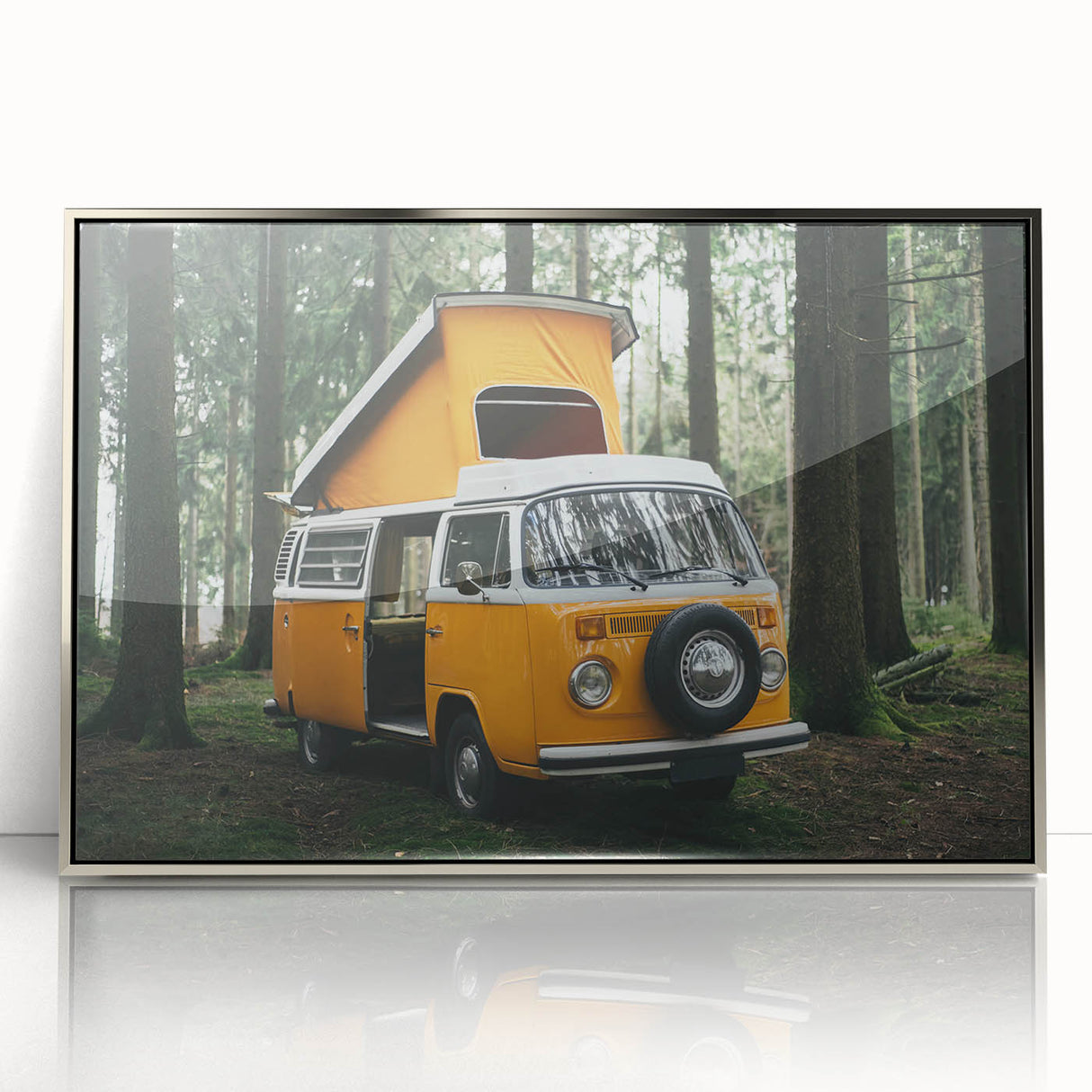 Art deco poster of a vintage caravan in silver and black tones, acrylic print framed in silver.