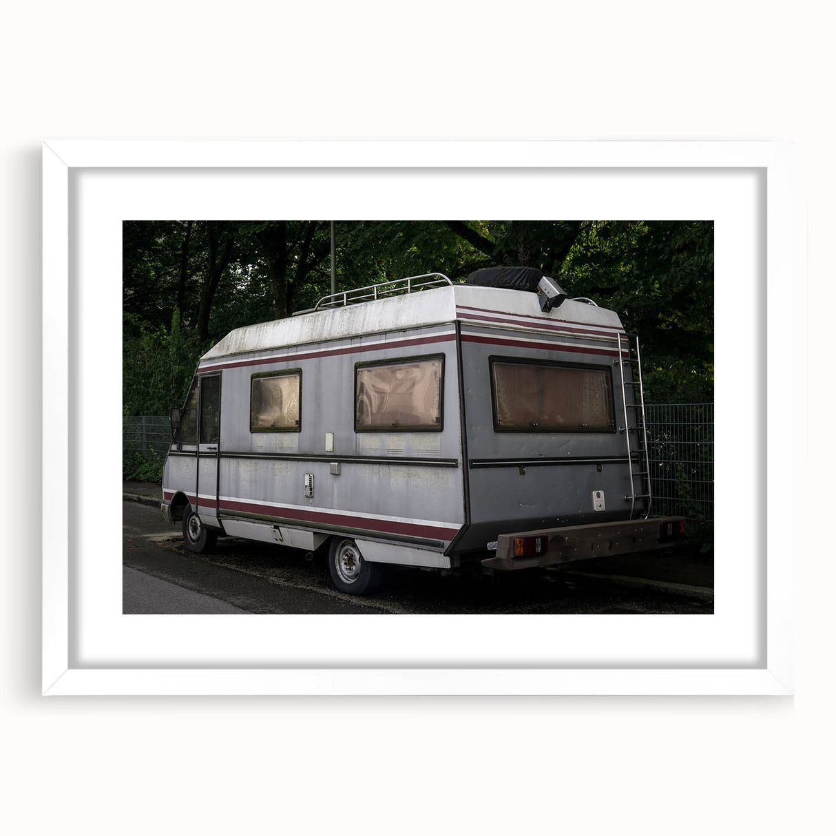 Extra large abstract art print of a caravan in muted earth tones on a white framed canvas, ideal for living room decor.