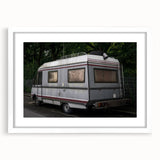 Extra large abstract art print of a caravan in muted earth tones on a white framed canvas, ideal for living room decor.
