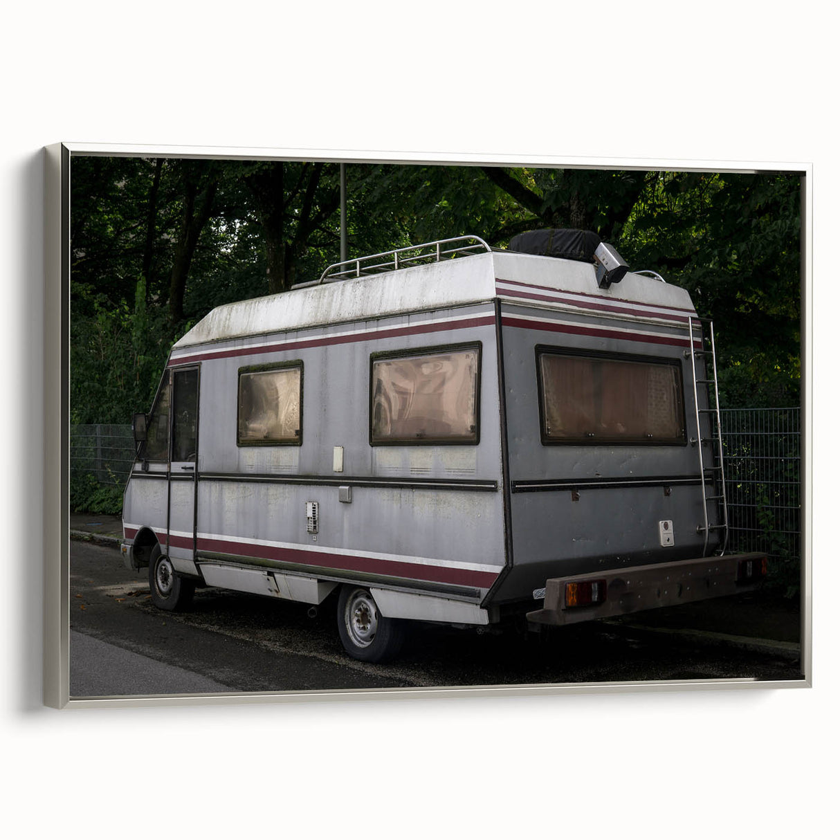 Vintage poster art of a caravan in colorful hues on a black background, framed canvas, suitable for living room decor.