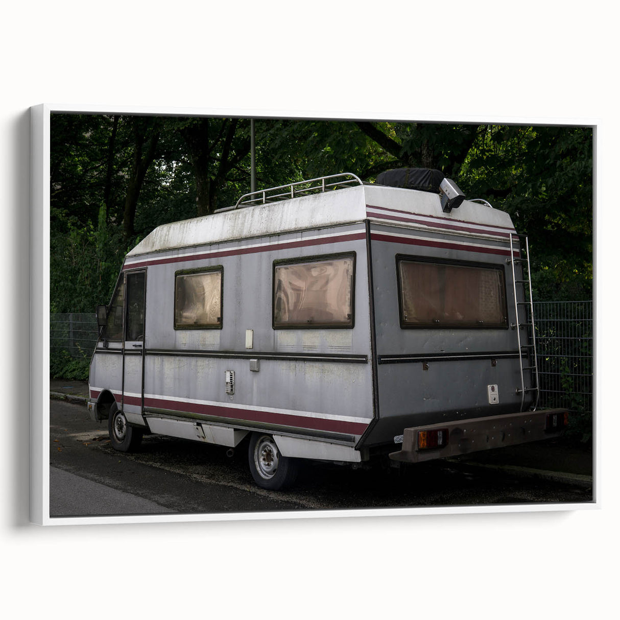 Framed canvas featuring a black and white vintage poster of a caravan landscape, ideal for bedroom wall art.