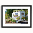 Extra large abstract art print of a colorful, textured caravan on a black framed canvas, ideal for living room decor.