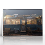 Mid-century modernist style caravan depicted in muted colors on a white acrylic framed print.