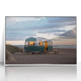 Mid-century modernist caravan depicted in soft pastel colors on a white framed acrylic print, suitable for nursery wall art.