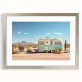 Abstract art print of a caravan in muted earth tones on a framed silver mat, suitable for dining room decor.