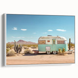 Framed canvas featuring a vintage caravan in a landscape setting, with a palette of black and colorful art.