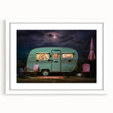 Extra large abstract art print featuring a textured caravan scene in muted earth tones, framed with a white mat.