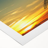 Art deco poster featuring a vintage car in muted gold and black tones on rolled canvas, suitable for dining room decor.