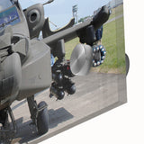 Large abstract wall art featuring a helicopter design in muted grays on acrylic glass, suitable for dining room ambiance.