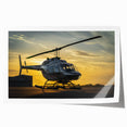 Helicopter silhouette against a sunset sky on a rolled canvas, suitable as art wall dining room.