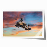 Helicopter silhouette over a sunset, in muted orange and purple tones on a rolled print, suitable for dining room decor.
