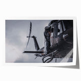 Helicopter in flight depicted in grayscale on a rolled print, suitable as art wall dining room decor.