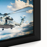 Framed canvas featuring a textured, black helicopter design with colorful accents.
