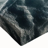 Large art of a black and white helicopter in flight on stretched canvas, suitable for bedroom wall placement.