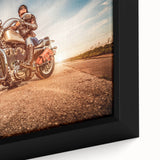 Extra large framed canvas of a black motorcycle on a textured, colorful background, ideal for living room decor.