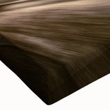 Black and white photo of a motorcycle on stretched canvas, ideal for bedroom wall art.