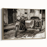 Vintage poster art of a motorcycle in black and gold on a framed canvas, ideal for bedroom wall decor.