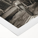 Art deco poster featuring a vintage motorcycle, rendered in monochrome shades, on rolled canvas.