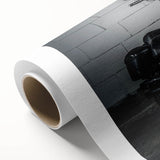 Art deco style motorcycle poster in monochrome shades, printed on rolled canvas.