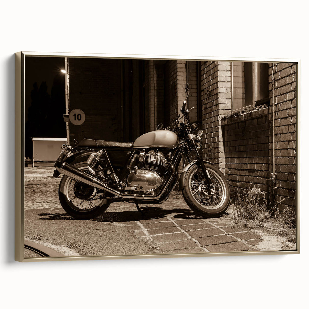 Side view of a vintage motorcycle in black and gold on a framed canvas, suitable for bedroom wall art.