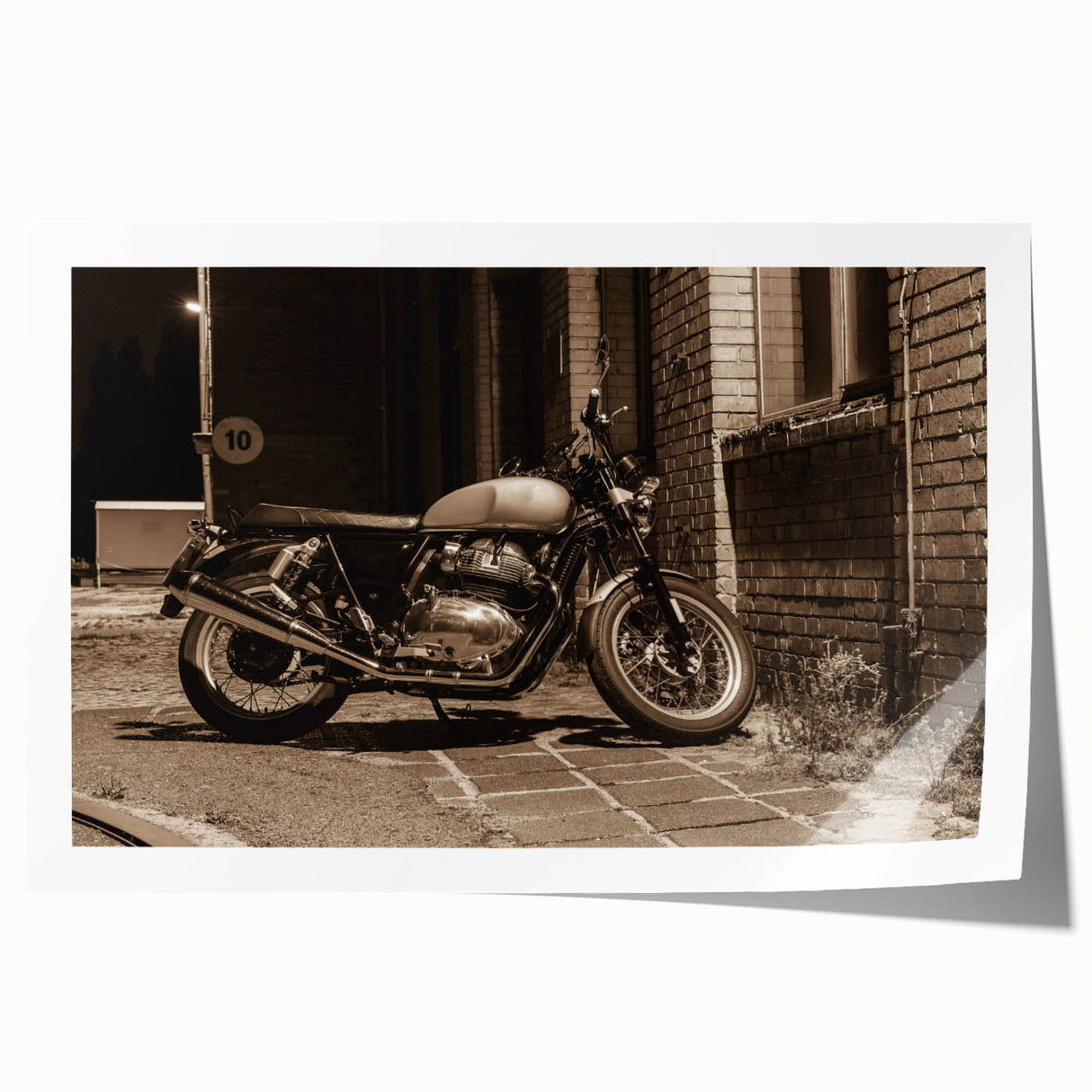 Extra large rolled print featuring a detailed motorcycle design on a muted gray background.