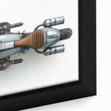 Close-up of a black framed canvas featuring a colorful, textured motorcycle design.
