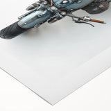 Art deco poster of a vintage motorcycle in muted metallic colors on a rolled canvas.
