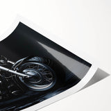 Extra large wall art featuring a black and white line art of a motorcycle on rolled print.