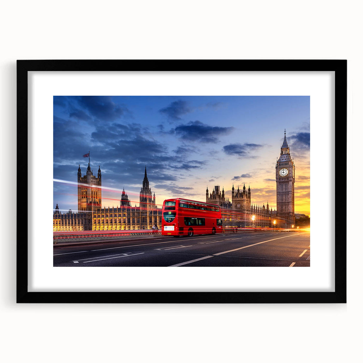 Colorful abstract art print featuring textured service vehicles, in a black frame with mat.