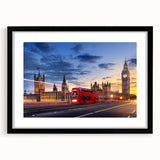 Colorful abstract art print featuring textured service vehicles, in a black frame with mat.