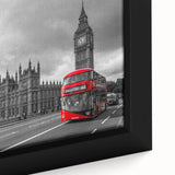 Close-up of a framed canvas featuring black wall art with colorful, textured images of service vehicles.