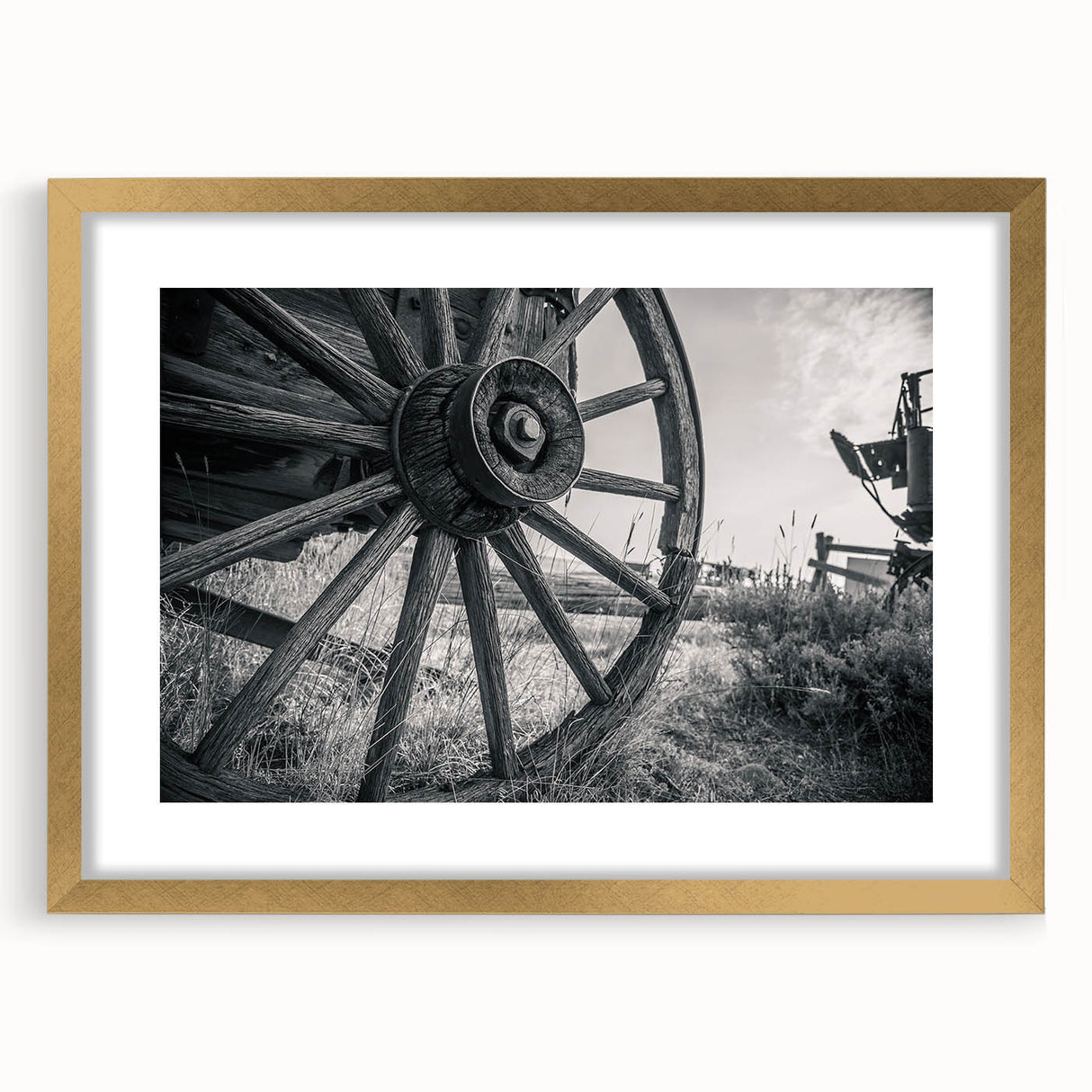 Extra large abstract art print of service vehicles in muted earth tones on a textured canvas, framed in gold.
