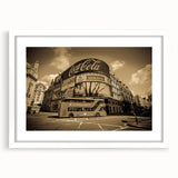 Abstract art print of assorted service vehicles in muted colors on a white framed canvas, suitable for dining room decor.