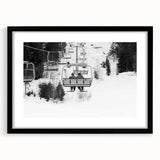 Abstract art print of colorful, textured service vehicles on a large canvas, framed in black, suitable for living room decor.