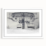 Abstract art print of service vehicles in muted gray and blue tones on a framed white canvas, suitable for dining room decor.