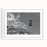 Abstract art print of colorful service vehicles on white framed canvas, ideal for dining room decor.