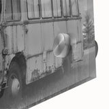 Mid-century modernist art featuring abstract design of service vehicles in muted earth tones on large acrylic glass.