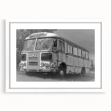 Abstract art print featuring a stylized depiction of service vehicles in muted blue and gray tones on a white framed canvas.