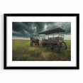 Extra large abstract art print of colorful, textured service vehicles on a black framed canvas, ideal for living room decor.