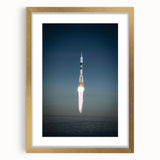 Textured abstract art print of a spacecraft in muted gray, ideal for modern bedroom decor, framed with a gold mat.